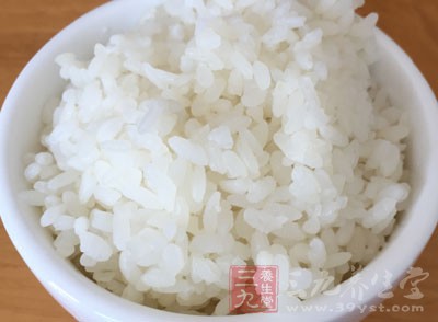 然後均勻沾裹上米粒